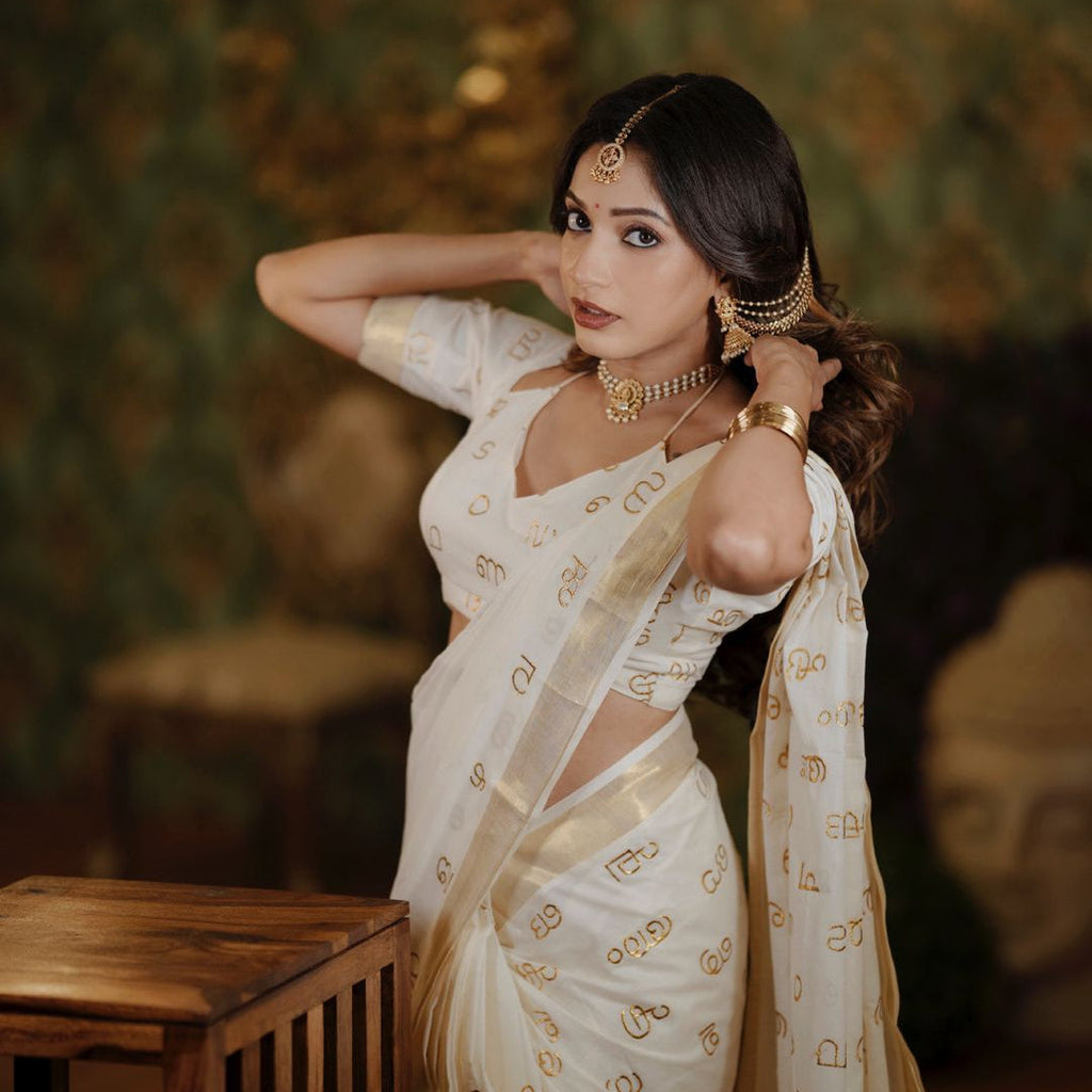 Malayalam Akshara Mala Embroidered Premium Cotton Saree – White with Golden Border
