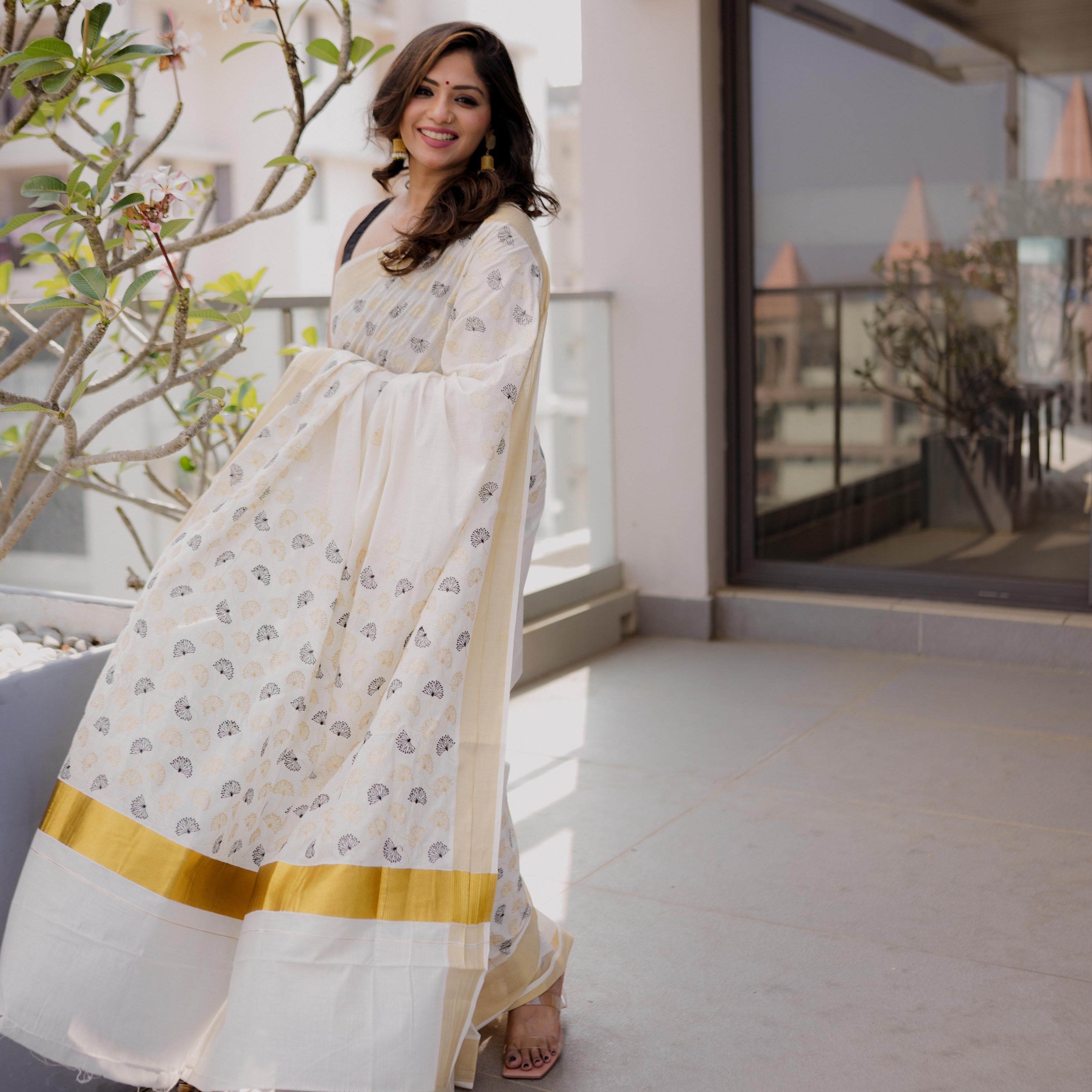 Myil Ezha – Premium Gold & Black Cotton Embroidered Saree