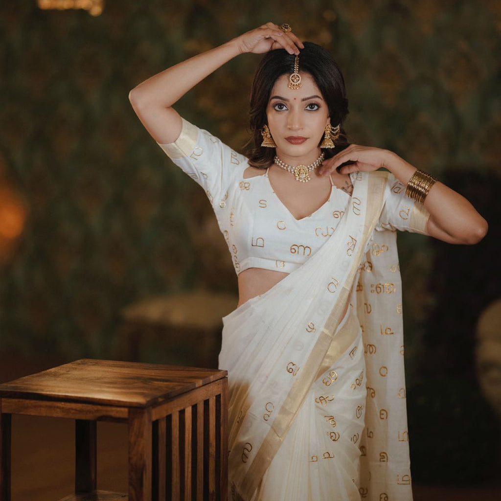 Malayalam Akshara Mala Embroidered Premium Cotton Saree – White with Golden Border