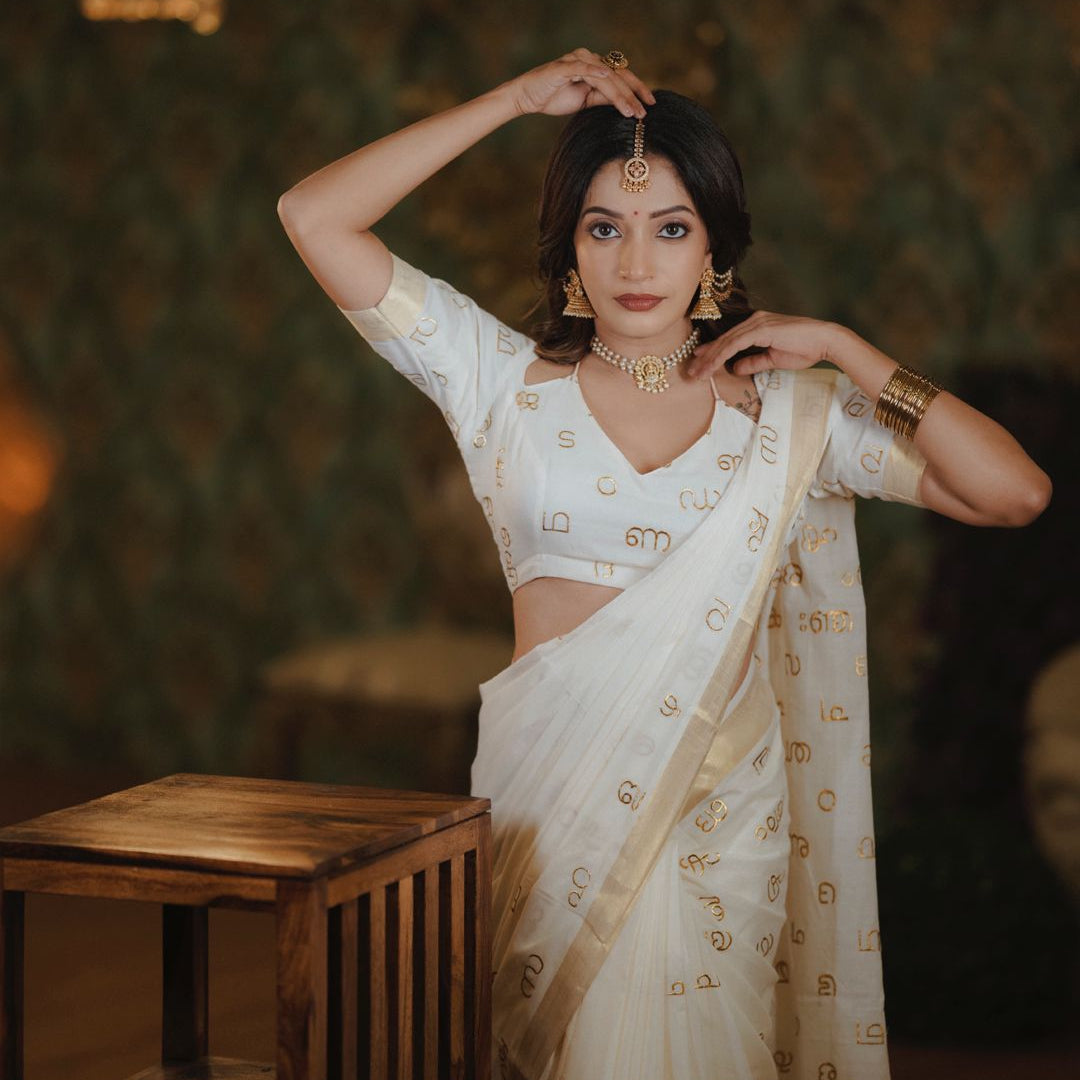 Malayalam Akshara Mala Embroidered Premium Cotton Saree – White with Golden Border