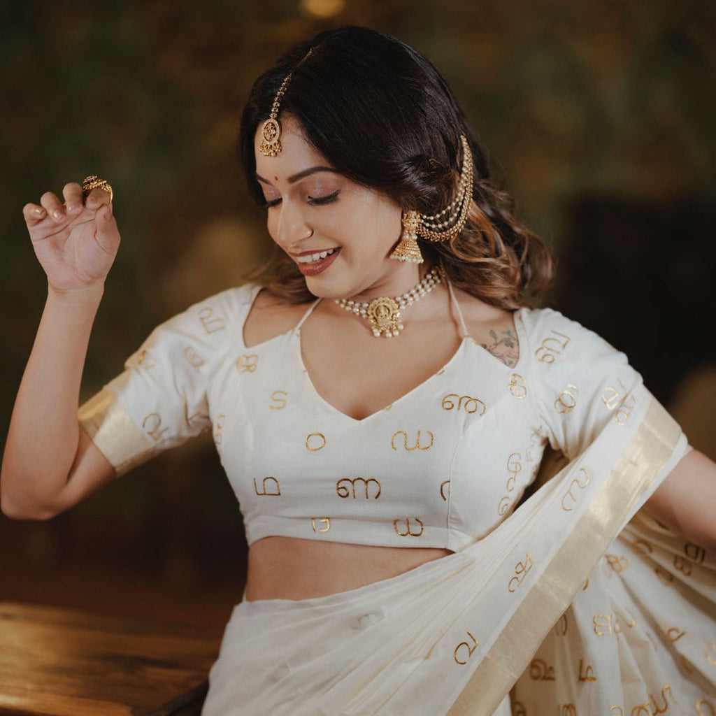Malayalam Akshara Mala Embroidered Premium Cotton Saree – White with Golden Border