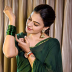 Bottle Green Mulmul Cotton Saree – Celebrity Inspired Elegant Wear